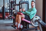 Seated leg curls. (Image via Freepik)